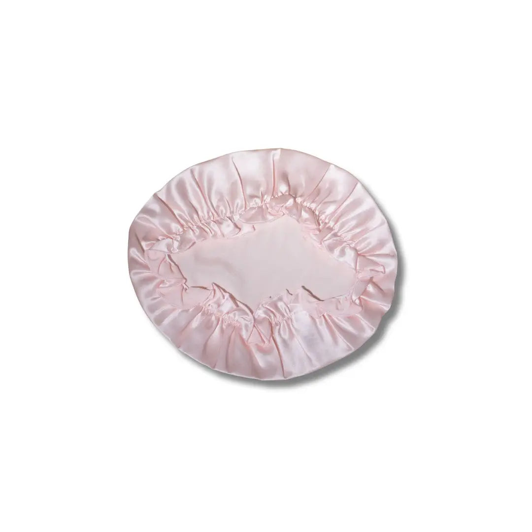 Bonnet de nuit en soie naturelle rose, idéal pour protéger les cheveux et réduire les frisottis pendant le sommeil - SILKHOUSE